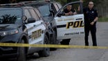 Police officers guard the scene of an alleged human smuggling mass casualty event in San Antonio, Texas, the United States, on June 28, 2022. The death toll of migrants found on Monday inside a "cloned" and abandoned 18-wheeler in San Antonio has risen to 50, authorities said on Tuesday. (Photo by Nick Wagner/Xinhua via Getty Images)