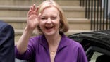 Liz Truss waving