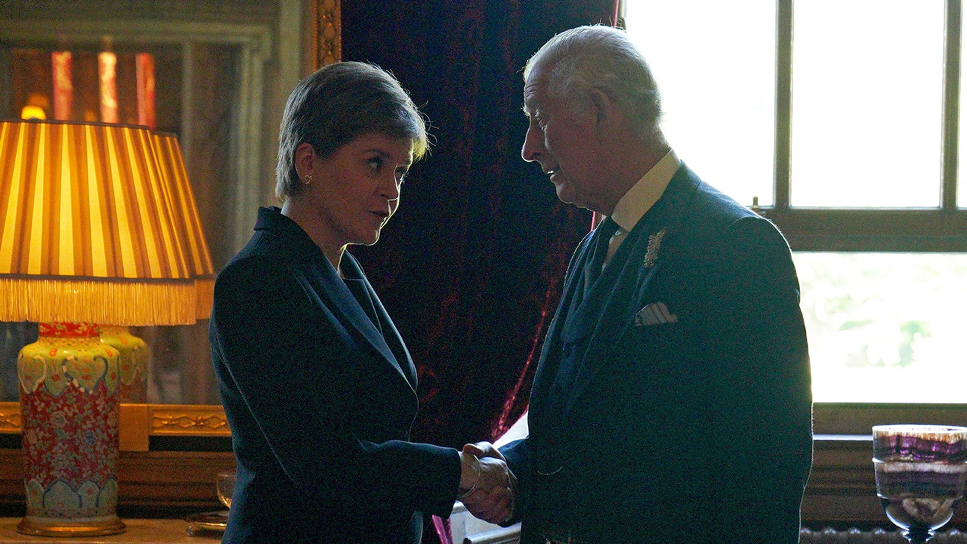 Britain's King Charles III (R) has an audience with Scotland's First Minister Nicola Sturgeon (L)