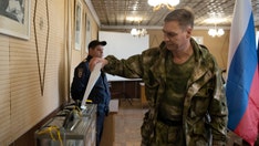 Russian proxies intimidate Ukrainians and force referendum vote on annexation: local official
