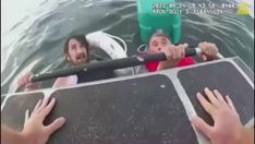 Video shows father, son pulled from Boston Harbor after boat sinks: 'We're so weak'