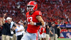 Defending champion No. 3 Georgia routs No. 11 Oregon, 49-3