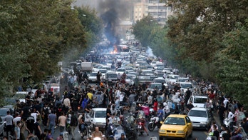 Iran protests: 9 dead in escalating unrest as demonstrators set fire to police stations, stab regime enforcer