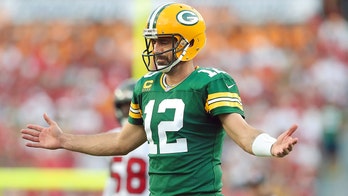 Aaron Rodgers suggests he played part in Bucs' penalty during 2-point try