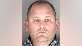 Kansas ex-teacher, basketball coach gets 30 years for child pornography