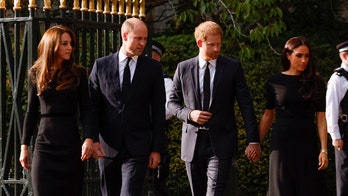Harry and Meghan appear with William and Kate to greet mourners at Windsor Castle