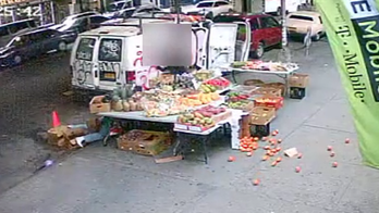 NYC robbery victim tackled into fruit stand, video shows