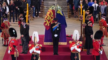 Queen Elizabeth II's grandchildren, including Princes Harry and William, hold vigil at coffin
