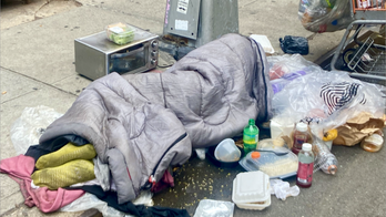 New York City homeless man sleeps on sidewalk with toaster oven, crisis worst 'since Great Depression'