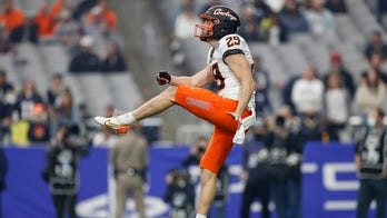 Oldest FBS player makes season debut for Oklahoma State