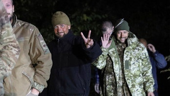 Ukraine receives hundreds of POWs from Russia in prisoner swap for top Putin ally