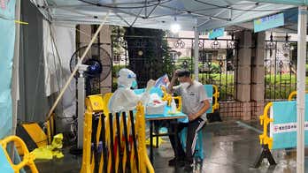 China's Shenzhen begins reinstituting COVID restrictions as cases spike