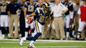 NFL great Torry Holt was ‘p——d off’ when Rams left St. Louis for LA, hopes to ‘bridge that gap’ between cities