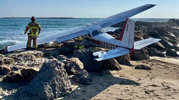 Small plane crashes on Southern California beach’s jetty
