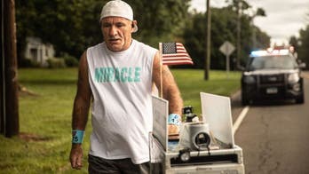 Retired flight attendant paying tribute to 9/11 flight crews by pushing beverage cart from Dulles to Pentagon