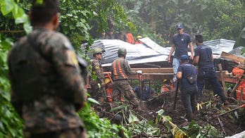 Bodies of 2 El Salvador children recovered after drowning in rain-swollen gully