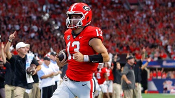 Defending champion No. 3 Georgia routs No. 11 Oregon, 49-3