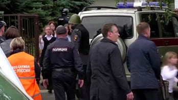 Swastika-wearing gunman kills 15 in Russian school shooting