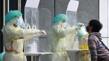 Taiwan looking to end COVID quarantine early for arrivals