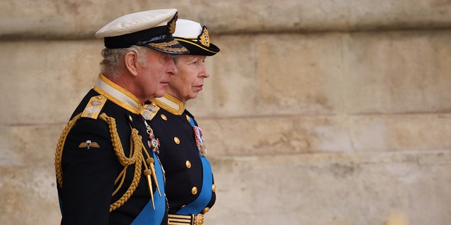 King Charles III and Anne, the Princess Royal leave Westminster Abbey after the funeral service of Queen Elizabeth II in London on September 19, 2022.