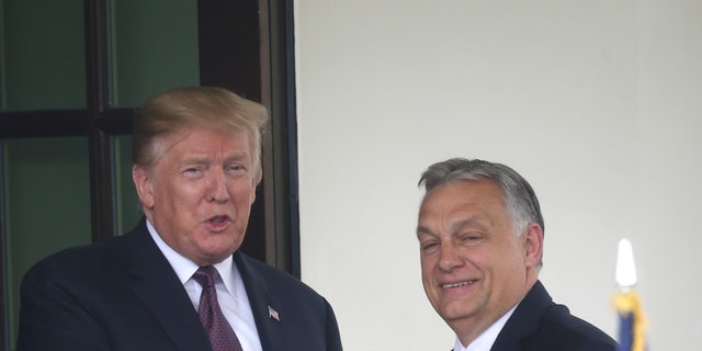 President Trump welcomes Hungary's Prime Minister Viktor Orban as he arrives at the White House May 13, 2019. 