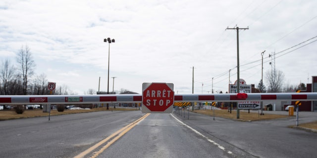 An empty border crossing is seen leading into Rouses Point, NY at the U.S.-Canada border crossing in Lacolle, Quebec, Canada March 19, 2020.  