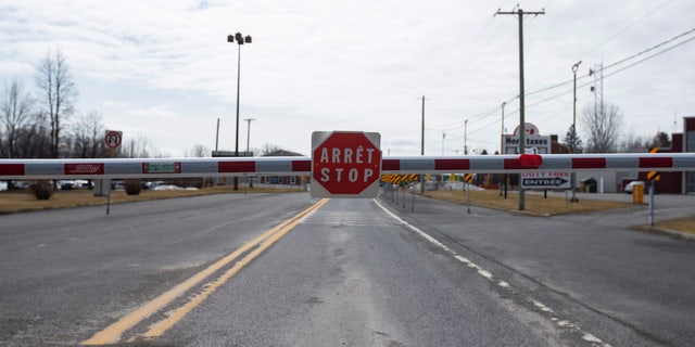 An empty border crossing is seen leading into Rouses Point, NY at the U.S.-Canada border crossing in Lacolle, Quebec, Canada March 19, 2020.  