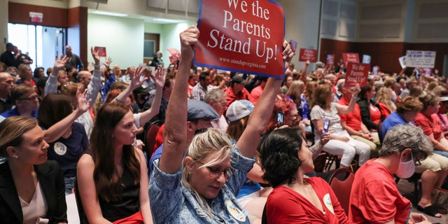 Parents and community members attend a Loudoun County School Board meeting about critical race theory in Ashburn, Virginia, on June 22, 2021.