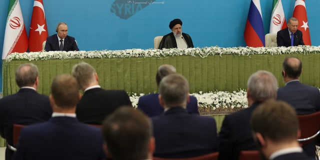 Iranian President Ebrahim Raisi, Russian President Vladimir Putin and Turkish President Recep Tayyip Erdogan attend a news conference following the Astana Process summit in Tehran, Iran July 19, 2022. 