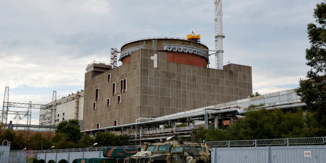 A Russian all-terrain armored vehicle is parked outside the Zaporizhzhia Nuclear Power Plant during the visit of the International Atomic Energy Agency's (IAEA) expert mission.