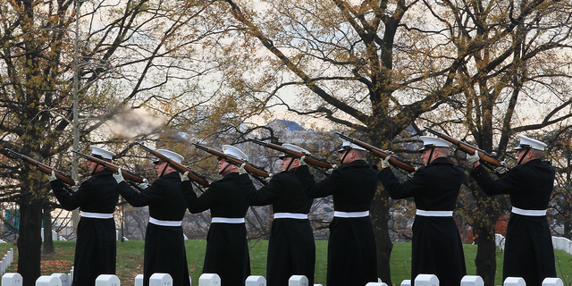 A U.S. Marine firing party fires a 21-gun salute during a funeral service for U.S. Marine Staff Sgt. Javier Ortiz Rivera at Arlington National Cemetery Dec. 2, 2010 in Arlington, Virginia. Rivera, from Rochester, New York, was reportedly killed Nov. 16, 2010 during combat operations in Afghanistan.