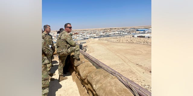 U.S. CENTCOM chief Gen. Erik Kurilla surveys the al-Hol camp in Syria. 