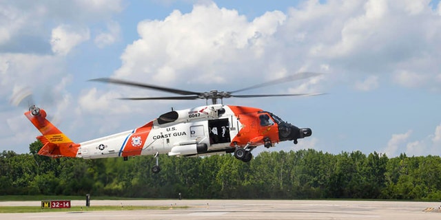 A U.S. Coast Guard helicopter lands at at the Naval Air Station Joint Reserve Base New Orleans.