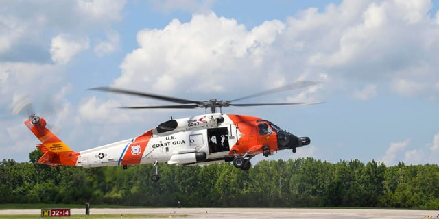A U.S. Coast Guard helicopter lands at at the Naval Air Station Joint Reserve Base New Orleans.