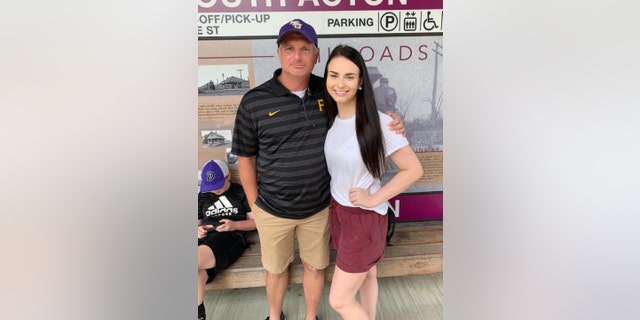 Allison Rice poses with her father.