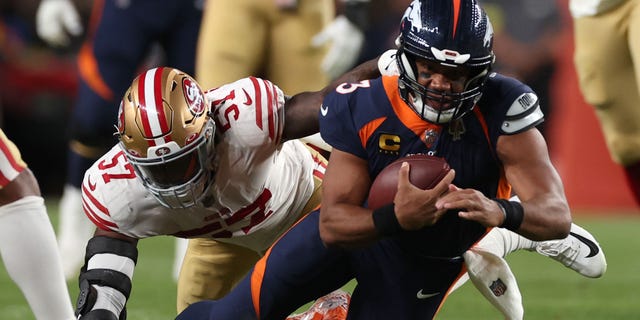 Russell Wilson #3 of the Denver Broncos rushes during the first half against the San Francisco 49ers at Empower Field At Mile High on September 25, 2022 in Denver, Colorado.
