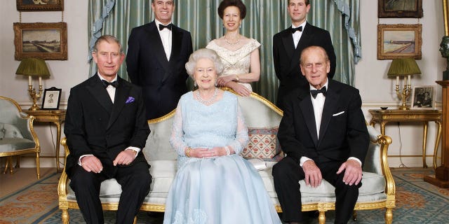 Queen Elizabeth, bottom center, and Prince Philip, bottom right, pose for a photo with children Charles, bottom left, Andrew, top left, Anne and Edward.