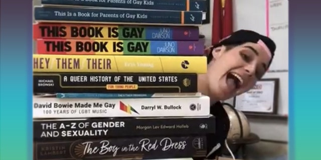 Flint's 'Queer Library' includes 'This Book is Gay', which is about orgies and sex apps.