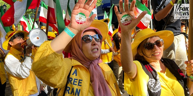 Protesters in Dag Hammarskjöld Plaza outside the United Nations building demonstrate against the Iranian regime's president, Ebrahim Raisi, for his direct role in the massacre of political prisoners in 1988. Raisi is to address the United Nations General Assembly today, September 21, 2022.
