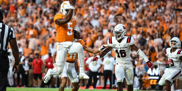 Tennessee Volunteers quarterback Hendon Hooker (5) jumps into the end zone for a touchdown during a game against the Ball State Cardinals Sept. 1, 2022, at Neyland Stadium, in Knoxville, Tenn. 