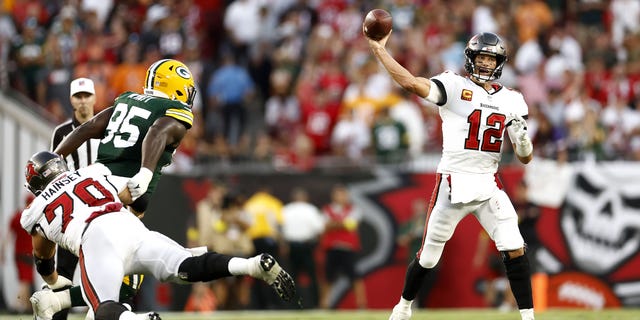 Tom Brady of the Tampa Bay Buccaneers throws a pass against the Green Bay Packers during the fourth quarter at Raymond James Stadium in Tampa, Florida, on Sept. 25, 2022.