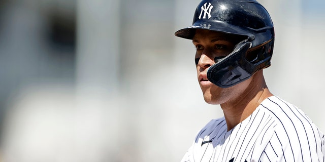 New York Yankees' Aaron Judge reacts after hitting a single during the sixth inning of the team's baseball game against the Tampa Bay Rays on Saturday, Sept. 10, 2022, in New York. 
