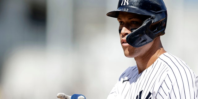 New York Yankees' Aaron Judge reacts after hitting a single during the sixth inning of the team's baseball game against the Tampa Bay Rays on Sept. 10, 2022, in New York.