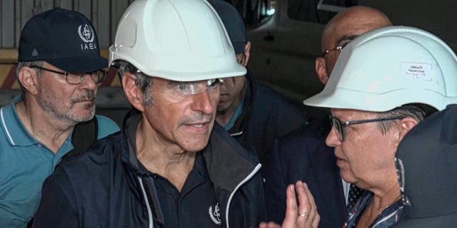 International Atomic Energy Agency (IAEA) Director Rafael Grossi, mission leader, center and IAEA members inspect the Zaporizhzhia Nuclear Power Plant in Enerhodar, southeastern Ukraine on Thursday, September 1, 2022. 