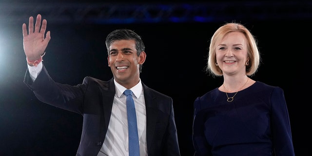 FILE - Liz Truss, right, and Rishi Sunak on stage after a Conservative leadership election hustings at Wembley Arena in London, Wednesday, Aug. 31, 2022. After weeks of waiting, Britain will finally learn who will be its new prime minister.  The governing Conservative Party will announce Monday, Sept. 5, 2022 whether Foreign Secretary Liz Truss or former Treasury chief Rishi Sunak won the most votes from party members to succeed Boris Johnson as party leader and British prime minister. 