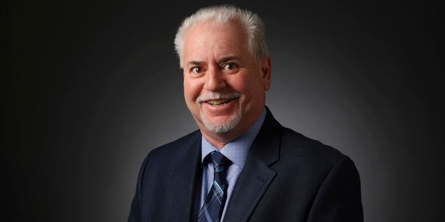 Jeff German, investigative reporter, poses for a portrait at the Las Vegas Review-Journal photos studio.