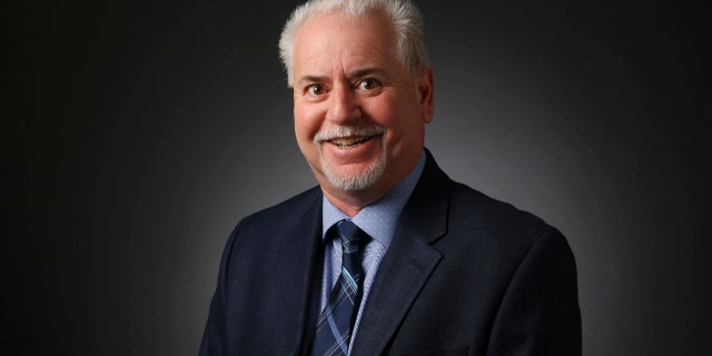 Jeff German, investigative reporter, poses for a portrait at the Las Vegas Review-Journal photos studio.