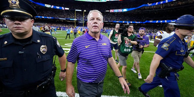 LSU head coach Brian Kelly walks off the field after losing to Florida State in an NCAA college football game in New Orleans, Sunday, Sept. Florida State won 24-23.