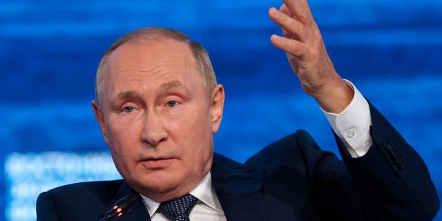 Russian President Vladimir Putin makes gestures during a plenary session at the Eastern Economic Forum in Vladivostok, Russia on Wednesday, September 7, 2022. 