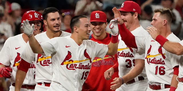 Cardinals' Tommy Edman was congratulated by his teammates after hitting a two-run double in a 6-5 win over the Washington Nationals in St. Louis on Wednesday, Sept. 7, 2022.